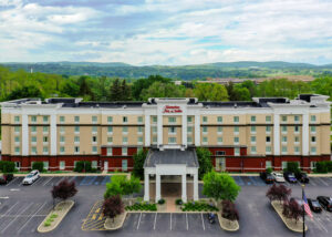 Aerial photo of front of Hampton Inn & Suites building